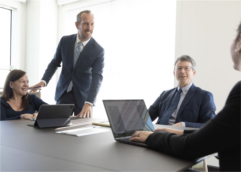 A group of attorneys at a table.